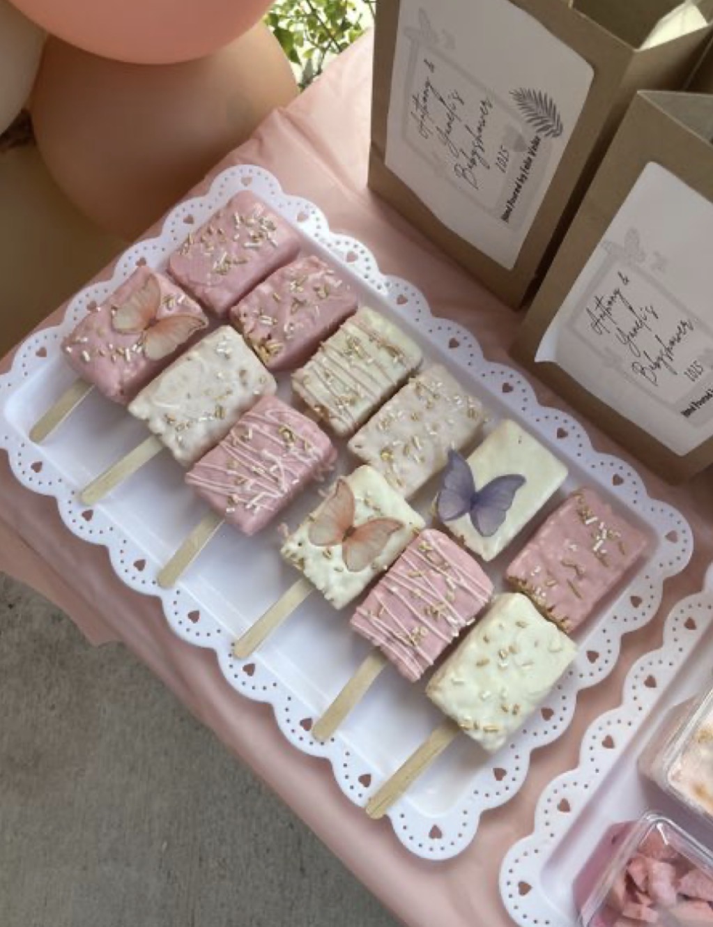 Pink and white rice krispy bars with butterflies