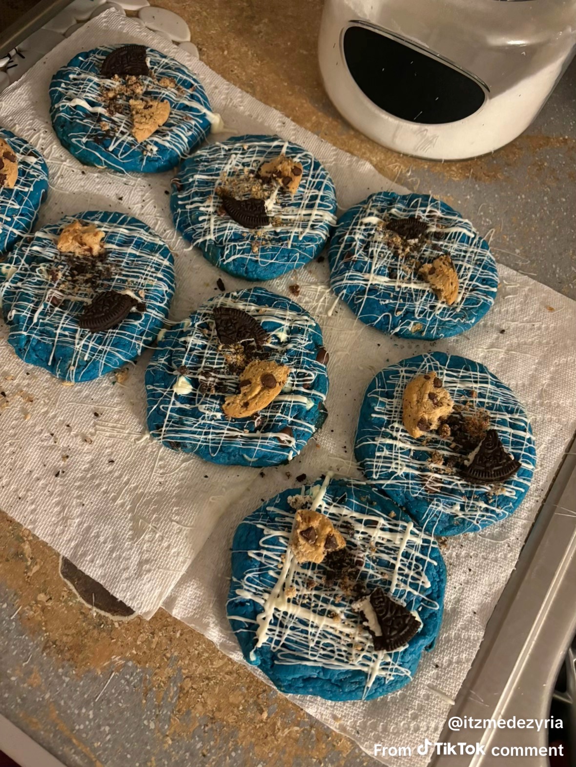 Blue cookies & cream cookies topped with Oreo and cookie dough